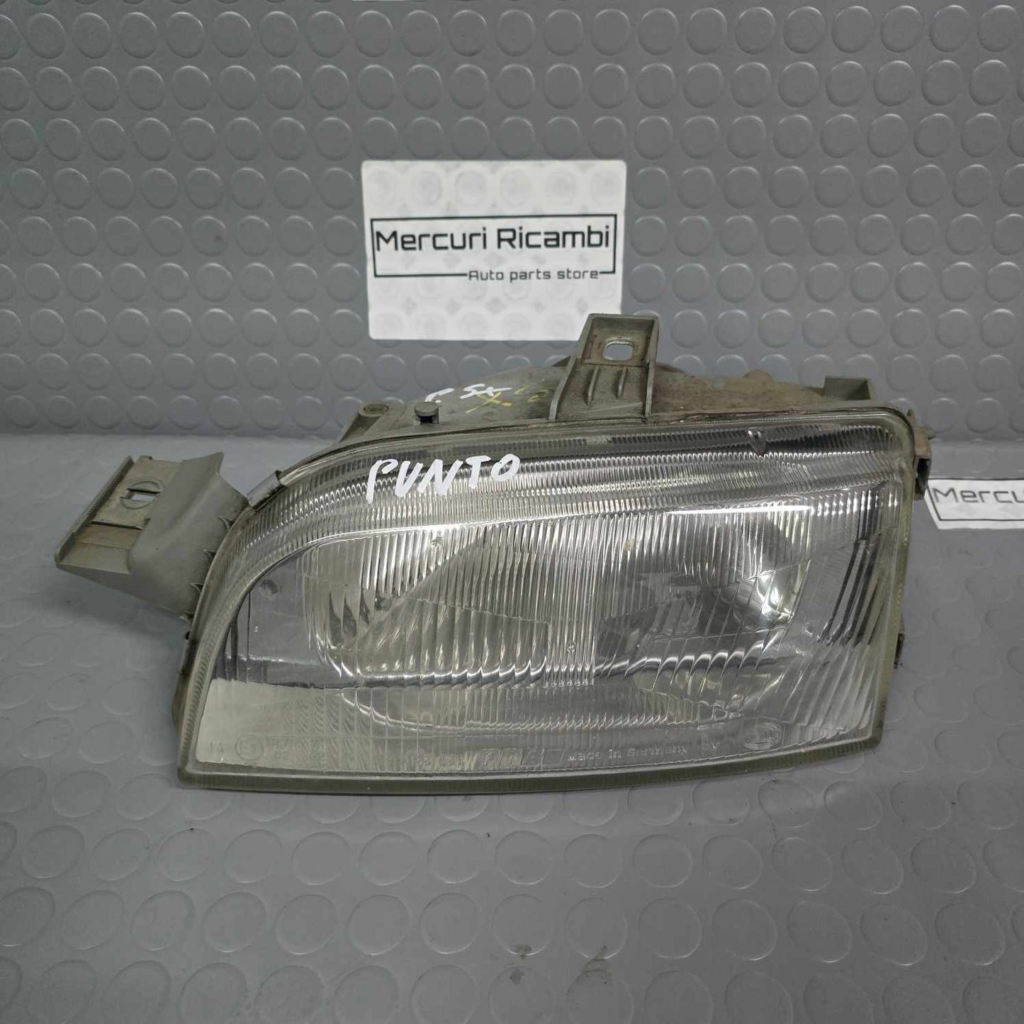 Proiettore sinistro Fiat Punto 1^ serie