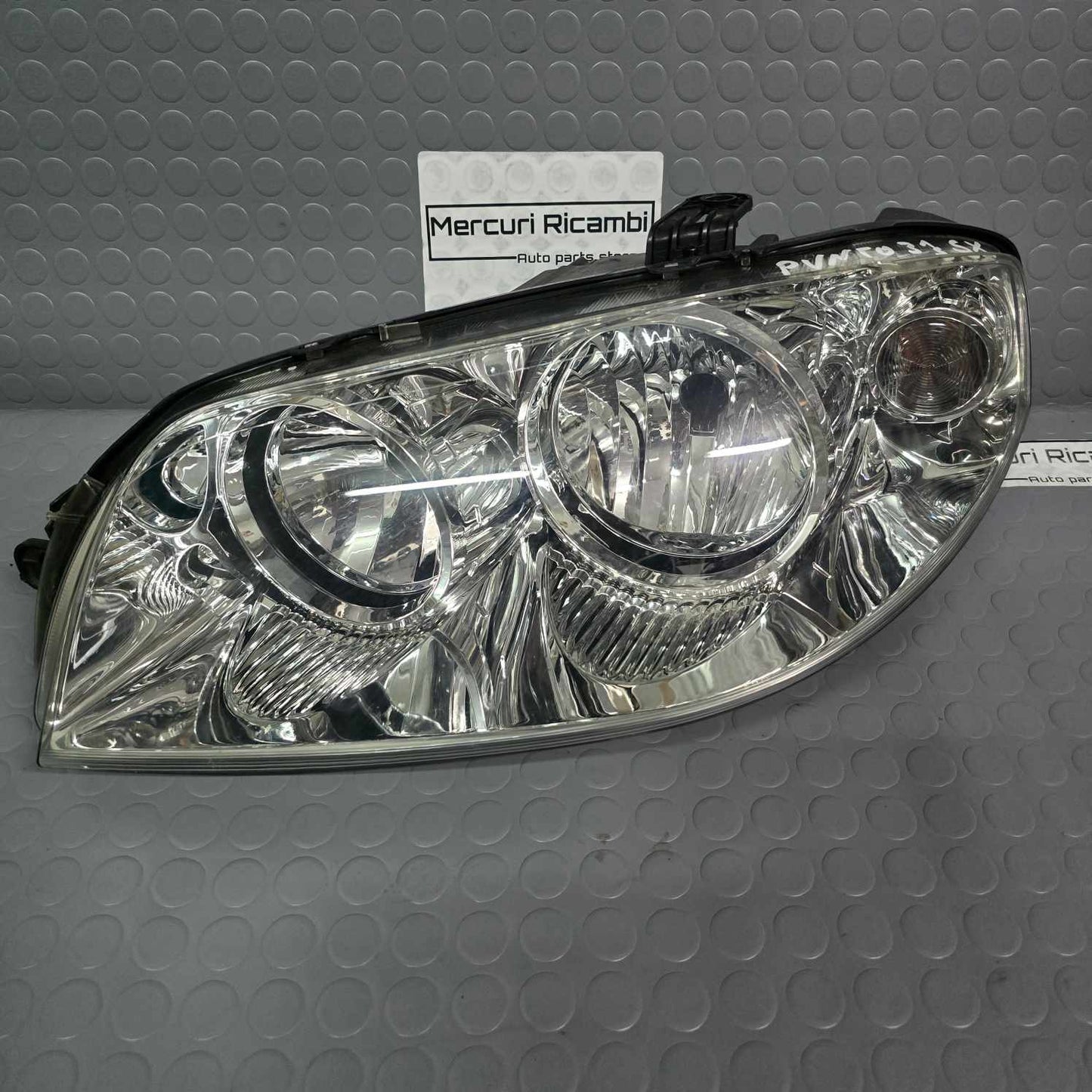 Proiettore sinistro Fiat Punto 3^ serie