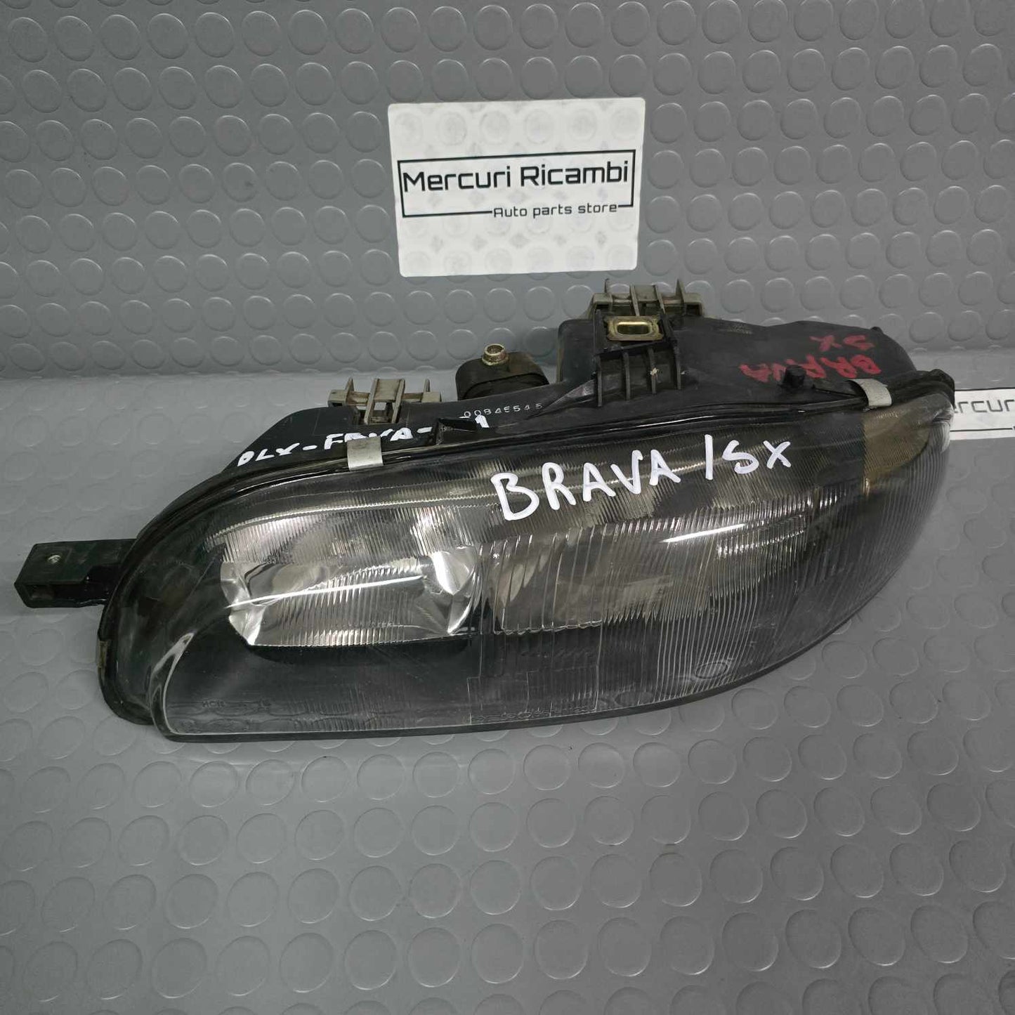 Proiettore sinistro Fiat Brava 1^ serie