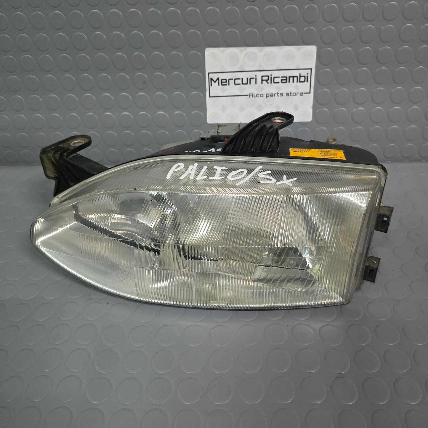 Proiettore sinistro Fiat Palio